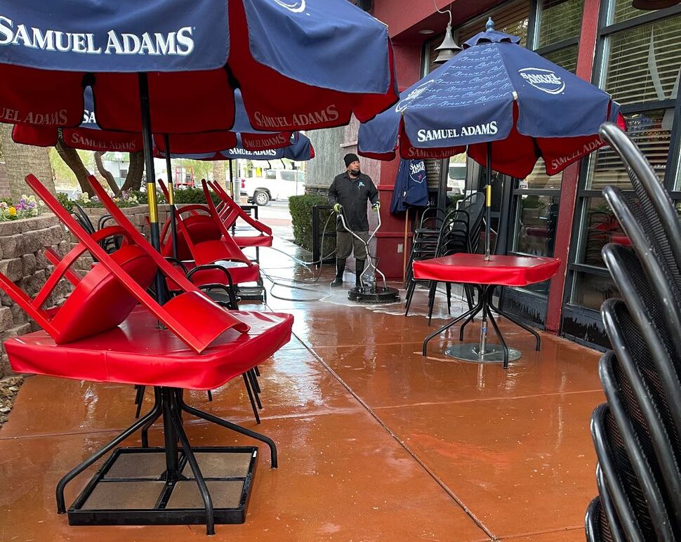 1660422403230_6226577904369664_742_resized a red tables and chairs under umbrellas